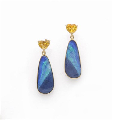 Lot 630 - A Pair of 18 Carat Gold Yellow Sapphire and Opal Drop Earrings, the heart brilliant cut yellow...