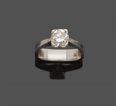 Lot 640 - A Diamond Solitaire Ring, the round brilliant cut diamond in a chunky white four claw setting, to a