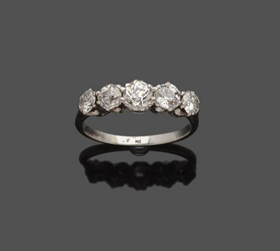 Lot 641 - A Five Stone Diamond Ring, the graduated old brilliant cut diamonds in white claw settings to a...