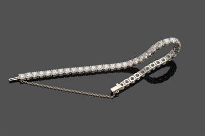 Lot 647 - A Diamond Line Bracelet, forty-one round brilliant cut diamonds in white articulated claw settings