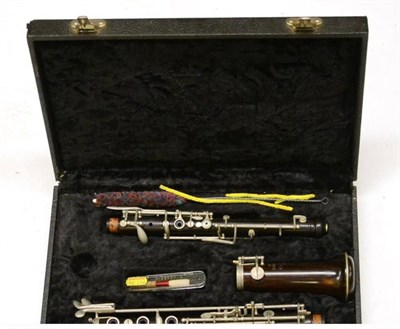 Lot 2076 - An Italian Rosewood Oboe, stamped 'F.I.S.M Rampone & Cazzani Italy', with nickel mounts, in a...