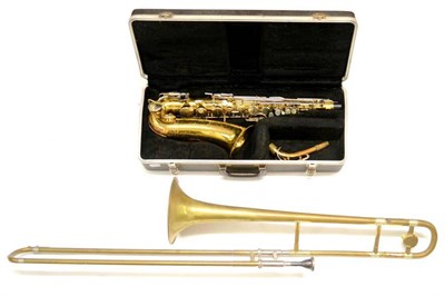 Lot 2078 - A Brass Bundy Alto Saxophone, in fitted case; A Brass Selmer Lincoln Trombone (2)