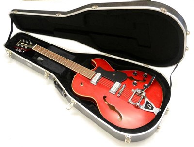 Lot 2087 - A DeArmond Guild Starfire Special, laminated maple body, cherry finish, Bigsby style tremelo,...