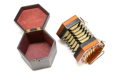 Lot 2110 - A Lachenal 20-Key Anglo System Concertina, with fretwork mahogany ends, makers paper label,...