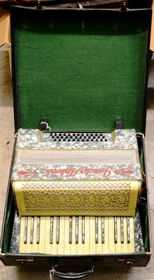 Lot 2111 - A Paulo Antonio Piano Accordion, with green pearl body, cased