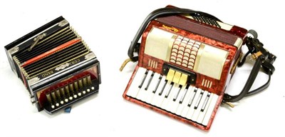 Lot 2115 - A Galotta Piano Accordion, with red pearl body, leather strap, cased; together with A Wooden 'Ceili