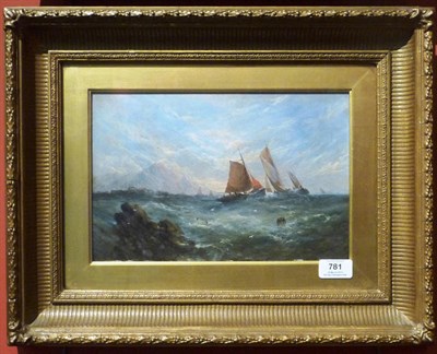 Lot 781 - Attributed to Frank May (ex.1882-1895) Fishing Boats off a Coastline in a Swell Signed, oil on...