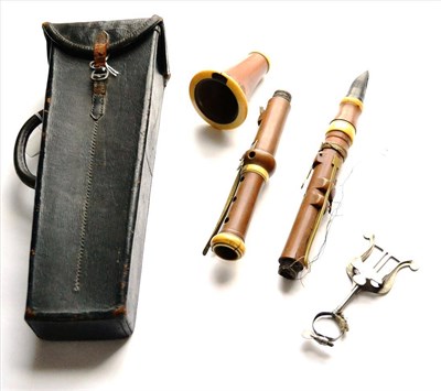 Lot 2045 - A 19th Century Boxwood Clarinet by C Gerock, Bishop Square Street, London, numbered '76', with...