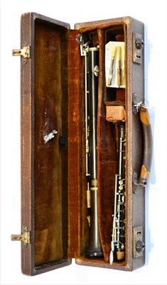 Lot 2047 - A Boosey & Co., London Oboe, serial number 25960, with nickel plated keys, three mouthpieces,...