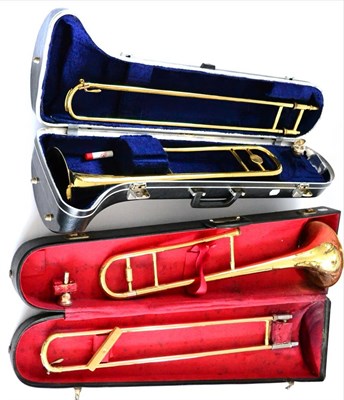 Lot 2054 - A Boosey & Hawkes Model 400 Brass Trombone, in a hard plastic case, together with a Blessing...