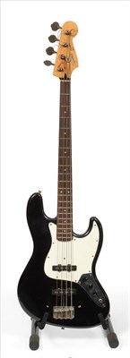 Lot 2065 - A Fender Squier Jazz Bass Guitar, with two pick-ups, black finish, Korean made, in hard case...