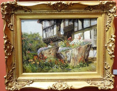 Lot 789 - Frank Moss Bennett (1874-1952) "Hawkenbury", garden scene in summer Signed, inscribed with the...