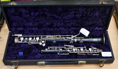 Lot 35 - A Rosewood Oboe by Howarth & Co., London, serial number C6602, with plated keys, in a fitted case