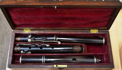 Lot 38 - A 19th Century Rosewood Flute by Wilde from Rudall & Rose, Strand, London, with nickel plated keys