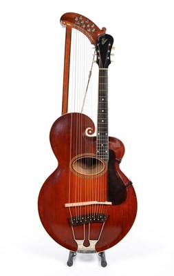 Lot 69 - A Rare 1916 Gibson U Harp Guitar, with stained maple back and rims, carved spruce top, oval...