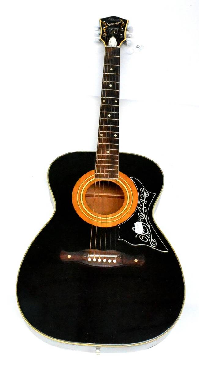 Lot 87 - A 1960s Harmony Sovereign Acoustic Guitar, black finish with moustache bridge, pearl dot...