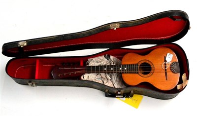 Lot 115 - A 1920s Oscar Schmidt Sovereign Mandolin, with rosewood grained guitar shaped body, spruce top,...