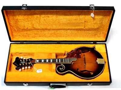 Lot 131 - A Sovereign F5 Gibson Style Mandolin, with scroll body, sunburst finish, inlaid torch headstock and