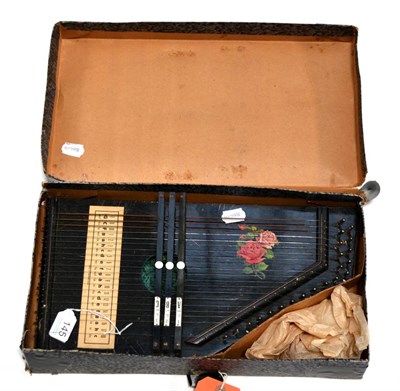 Lot 145 - A Czechoslovakian Made Auto Harp, with tuning key and manual, boxed