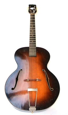 Lot 149 - A 1930s Regal Arch Top Acoustic Guitar, with laminated back and sides, trapeze tailpiece,...