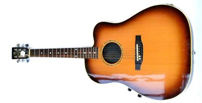 Lot 153 - A 1970s Tom Mates Electro Acoustic Guitar, designed for Paul Brett, with mahogany body, spruce cap