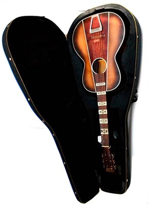 Lot 167 - A 1930s Deloro Six String Guitar, the birch body with simulated burrwood triangular 'inlay',...