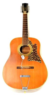 Lot 168 - A Folk 12 Dreadnought Style Guitar, with laminated rosewood back and sides, laminated spruce...