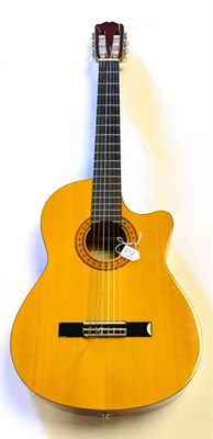 Lot 212 - A Takamine Electro Acoustic Classical Guitar, model EG124C, with laminated mahogany body, laminated