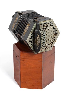 Lot 235 - A Thirty Key Anglo System Hexagonal Concertina by C.Jeffries, the pierced nickel plated ends...