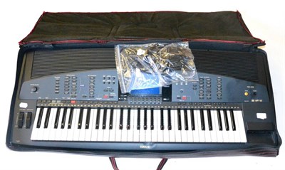 Lot 240 - A Yamaha PSR 4000 Electronic Keyboard, foot pedal and lead, with soft case