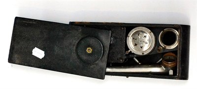 Lot 253 - An Excelda Portable Wind-Up Gramophone, with detachable horn and stylus, simulated Kodak camera...