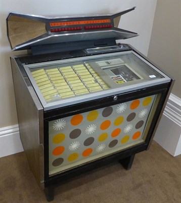 Lot 257 - A Bal-Ami Model CMM Jukebox, serial number 800306, containing a selection of 45rpm singles,...