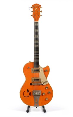 Lot 45 - A Gretsch G6121 Chet Atkins Solid Body Electric Guitar, with western maple stain, western...