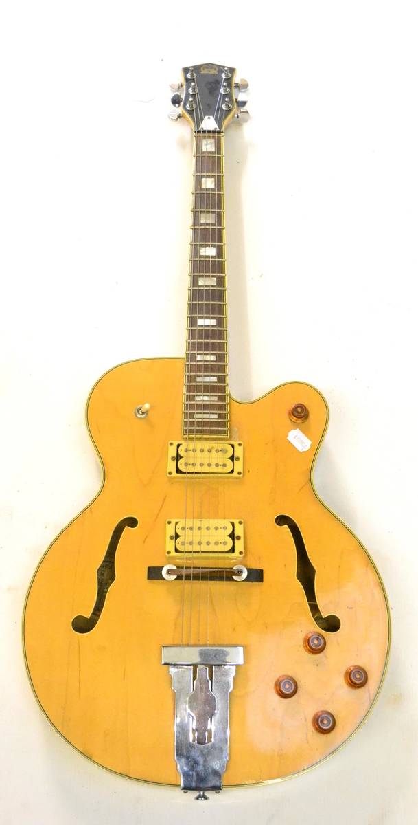 Lot 46 - A Japanese Hondo HL5 FBB Fatboy Electro-Acoustic Jazz Guitar, dated 1981, with hollow blonde...