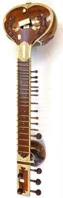 Lot 61 - A Modern Indian Sitar, with gourd body, foliate decoration