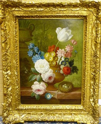 Lot 831 - Continental School (19th/20th century) Still Life of Primulas, a Tulip and Other Flowers in a Stone