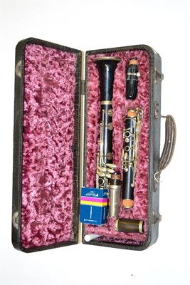 Lot 34 - A Buisson of Paris Rosewood Clarinet, with nickel keys, spare mouthpiece, in a plush lined case