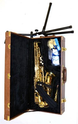 Lot 48 - An Artemis Mk.II Brass Alto Saxophone, serial number 0110182, with accessories and stand, in fitted