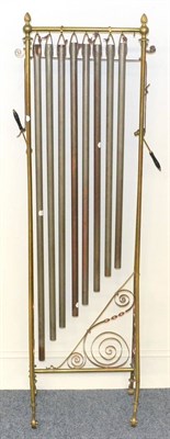 Lot 82 - An Upright Brass Frame of Eight Tubular Steel Bells, the frame with ornate wrought decoration...