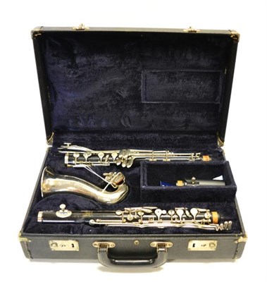 Lot 2023 - Conn Alto Clarinet keyed to low E flat, with two piece black wood body, metal neck and bell,...