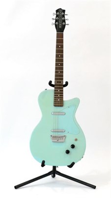 Lot 2044 - Danelectro Guitar no. 010967 Made in Korea, in aqua blue with matching scratchplate, twin...