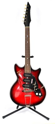 Lot 2045 - Egmond Super Solid 7, 1960 Made in Holland, red/black body with black raised pick-ups and...