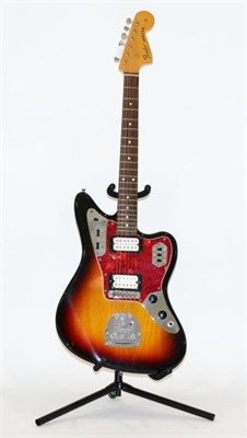 Lot 2062 - Fender Jaguar Guitar U022204 Made in Japan, sunburst finish with faux stained walnut...