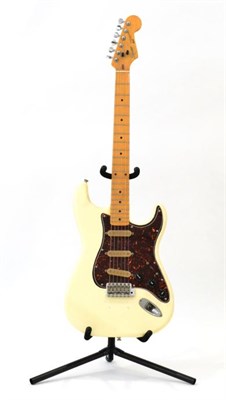 Lot 2066 - Fender Squier Stratocaster Guitar no.E755278 Made in Japan, cream body, brown marbles scratchplate