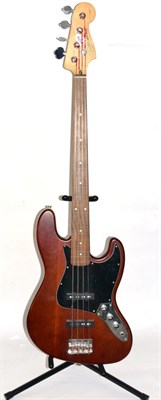 Lot 2074 - Fender Squier Jazz Bass Guitar (Indonesia) no.IC050501961, with wood finish body and black...