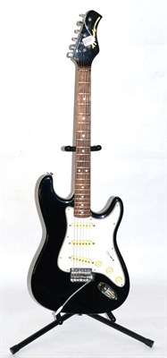 Lot 2095 - Hondo Electric Guitar Made in Korea, black body with white scratchplate, three single pick-ups...