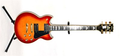 Lot 2124 - Yamaha SG1000RS Guitar no.20PO35E Made in Japan, sunburst body with black scratchplate, twin...