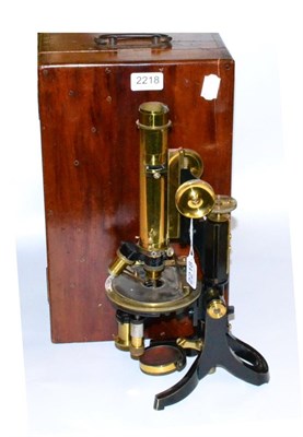 Lot 2218 - Petrographic Microscope By Swift with bullseye condenser, two lens turret, mechanical stage and...