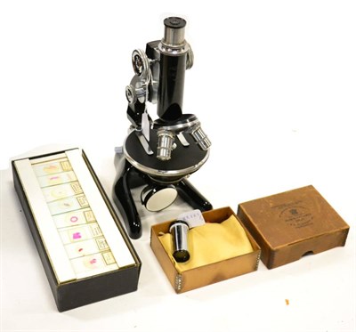 Lot 2220 - W & H Seibert (Wetzlar) Microscope black lacquered with three lens turret, tilting stand,...