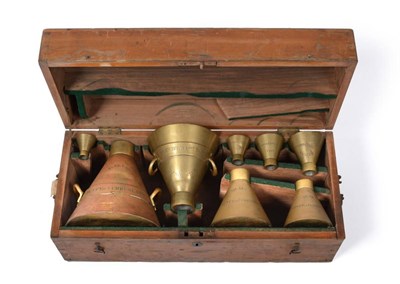 Lot 2239 - County Of Cumberland Trading Standards Liquid Measures By De Grave eight conical brass flasks:...